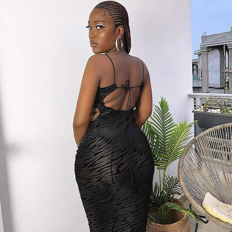 Bold Hollow-Out Cutout Bodycon Dress with Sleek Animal Print Texture